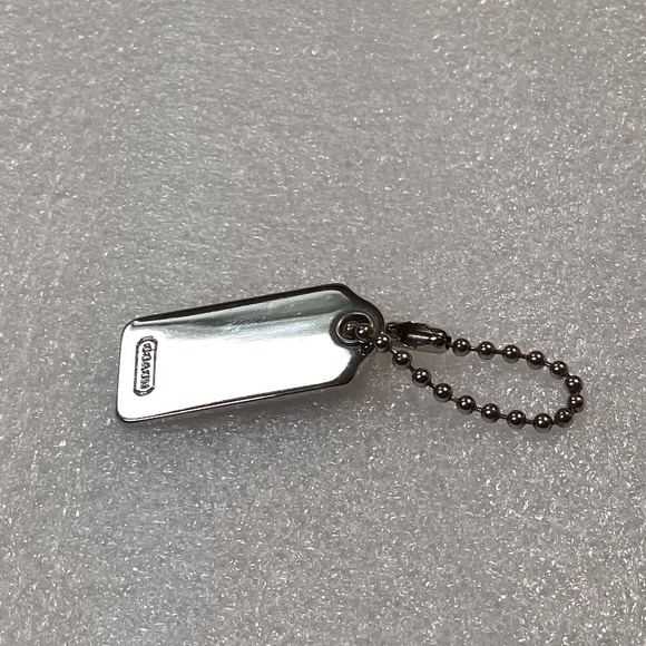 Coach Metal Bag Tag/Hang Tag 1.25”x 0.5” - Picture 2 of 14
